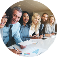 people-smiling-at-a-desk